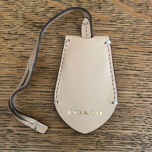 Coach logo hang tag key fob bag charm natural beige leather 2.5" x1 .75”